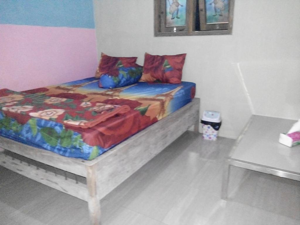 Yunior Guesthouse Tamansuruh Экстерьер фото