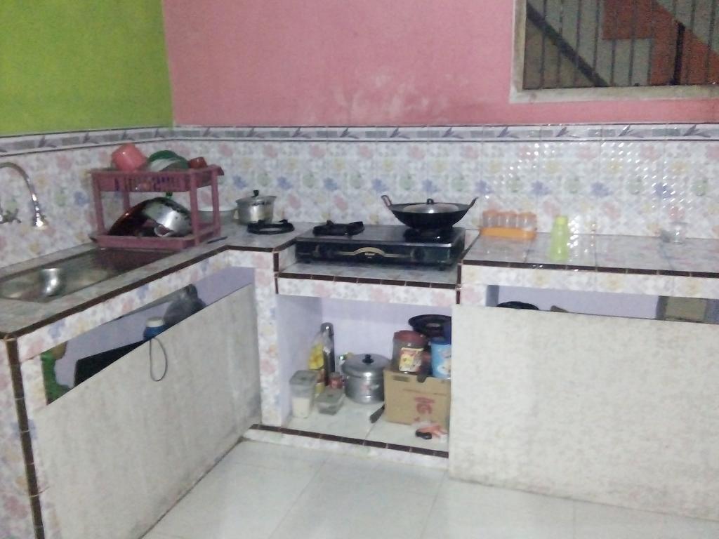Yunior Guesthouse Tamansuruh Экстерьер фото