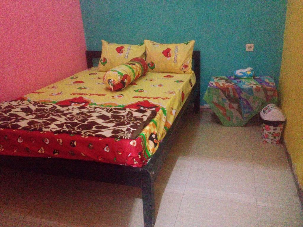 Yunior Guesthouse Tamansuruh Экстерьер фото