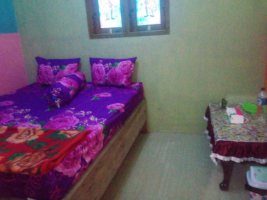 Yunior Guesthouse Tamansuruh Экстерьер фото