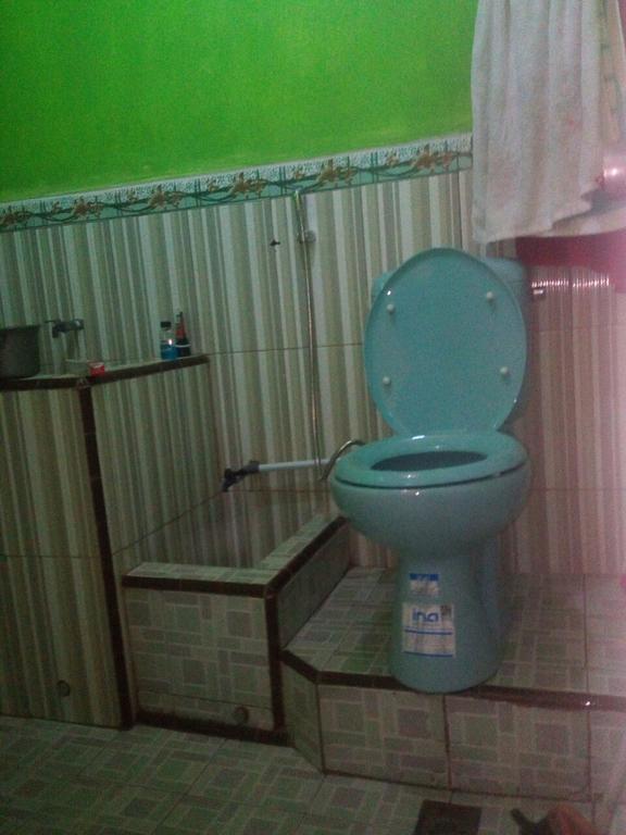 Yunior Guesthouse Tamansuruh Экстерьер фото